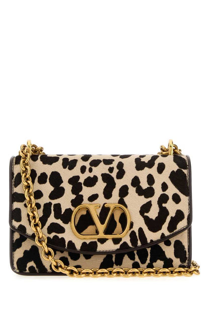 Valentino Garavani Handbags.