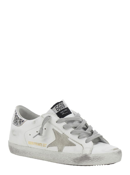 'Superstar' White Low Top Sneakers With Star Patch On The Side And Laminated Heel In Leather Woman